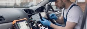 Mobile Car Stereo Installation in Birmingham – auto electrician installing a car stereo for Birmingham Auto Electrics.