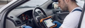 Flashing Engine Light Diagnostics Birmingham – auto electrician investigating a flashing engine warning light on a dashboard for Birmingham Auto Electrics.
